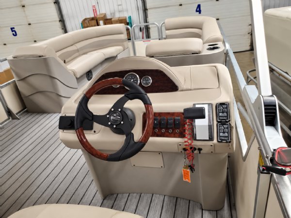 Pontoon boat helm with wood grain and black steering wheel